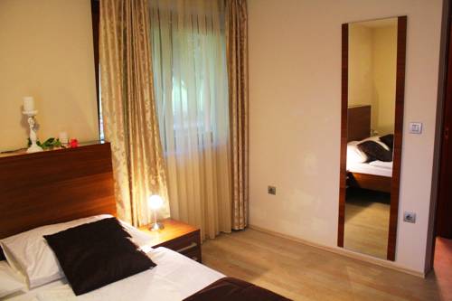 Imagen de la habitación del Hotel Villa Aina Boutique. Foto 14