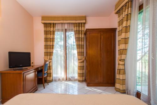 Imagen de la habitación del Hotel Villa Albani. Foto 8