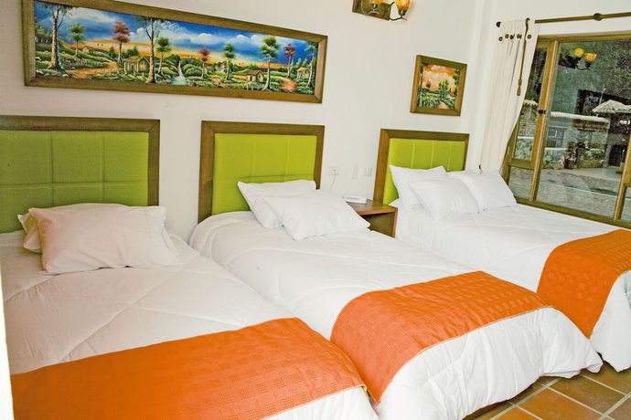 Imagen de la habitación del Hotel Villa Alegria. Foto 5
