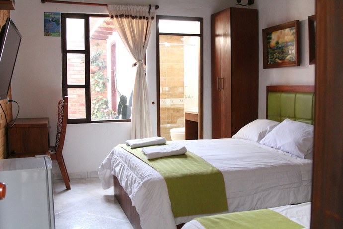 Imagen de la habitación del Hotel Villa Alegria. Foto 16