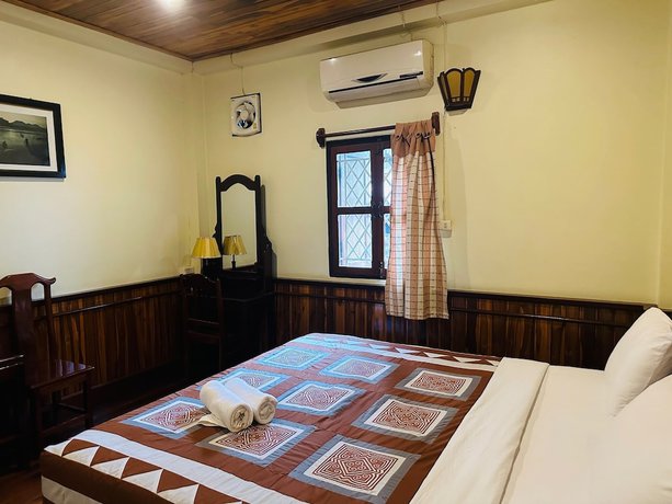 Imagen de la habitación del Hotel Villa Alounsavath Mekong Riverside. Foto 6