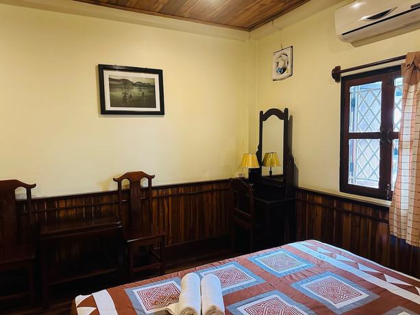 Imagen de la habitación del Hotel Villa Alounsavath Mekong Riverside. Foto 15