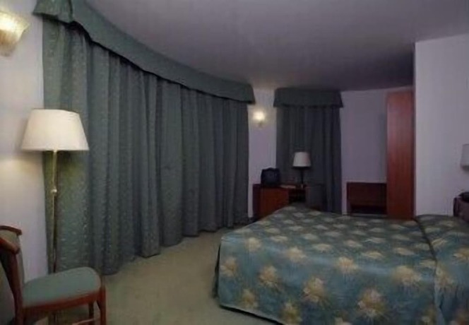 Imagen de la habitación del Hotel Villa Altura. Foto 11