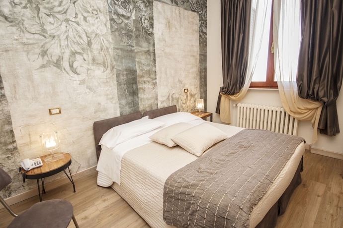 Imagen de la habitación del Hotel Villa Ambra. Foto 9