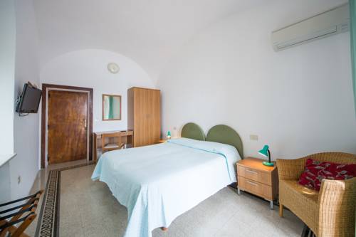 Imagen de la habitación del Hotel Villa Amore. Foto 9