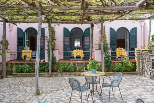 Imagen de la habitación del Hotel Villa Amore. Foto 10