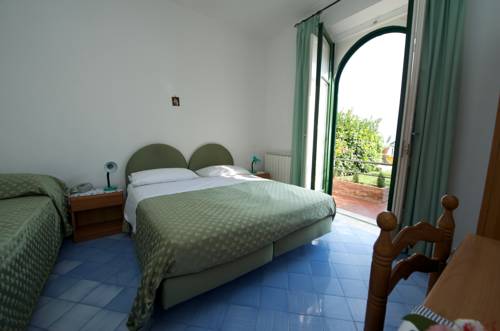 Imagen de la habitación del Hotel Villa Amore. Foto 12