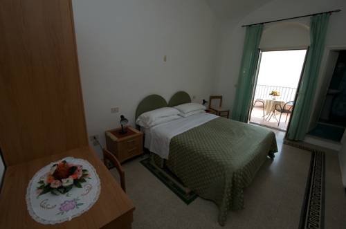 Imagen de la habitación del Hotel Villa Amore. Foto 13