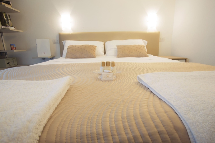 Imagen de la habitación del Hotel Villa Anthea. Foto 4