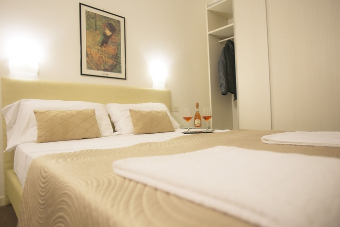 Imagen de la habitación del Hotel Villa Anthea. Foto 9