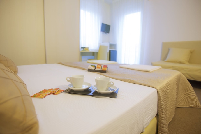 Imagen de la habitación del Hotel Villa Anthea. Foto 14