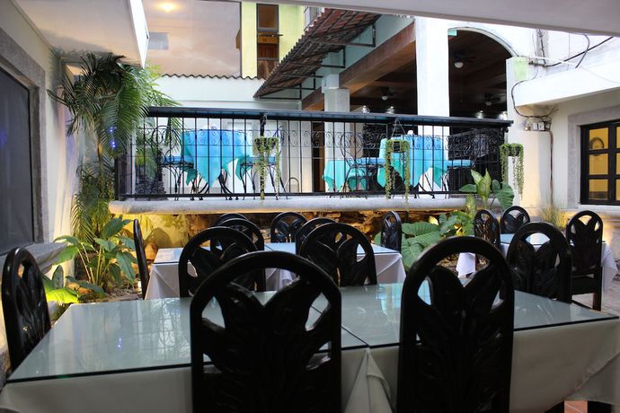 Imagen del bar/restaurante del Hotel Villa Antigua, San Salvador. Foto 7