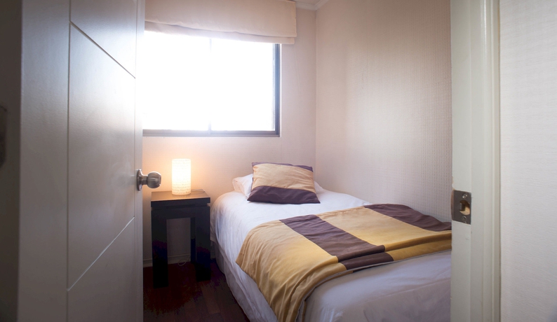 Imagen de la habitación del Hotel Villa Apartments Santiago. Foto 4