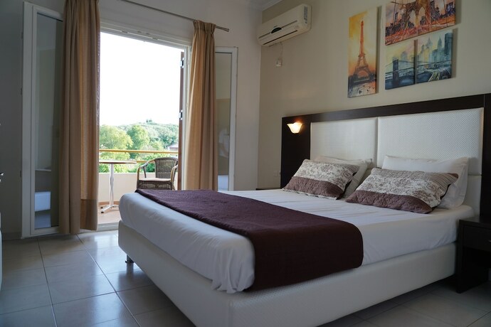 Imagen de la habitación del Hotel Villa Apollo Parga. Foto 16