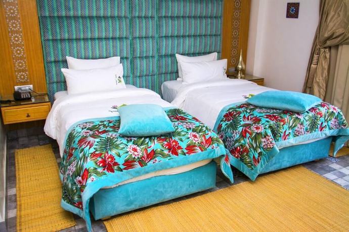 Imagen de la habitación del Hotel Villa Aralia. Foto 8