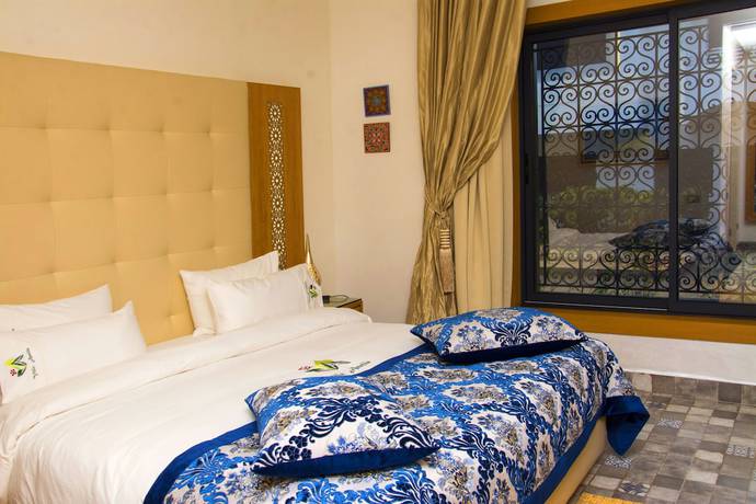 Imagen de la habitación del Hotel Villa Aralia. Foto 11