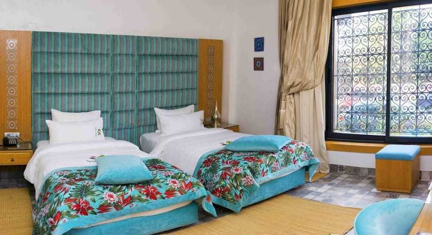 Imagen de la habitación del Hotel Villa Aralia. Foto 14