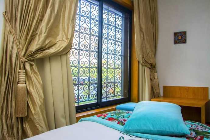 Imagen de la habitación del Hotel Villa Aralia. Foto 16