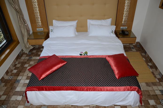 Imagen de la habitación del Hotel Villa Aralia. Foto 17