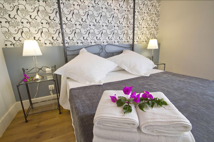 Imagen de la habitación del Hotel Villa Arce. Foto 6