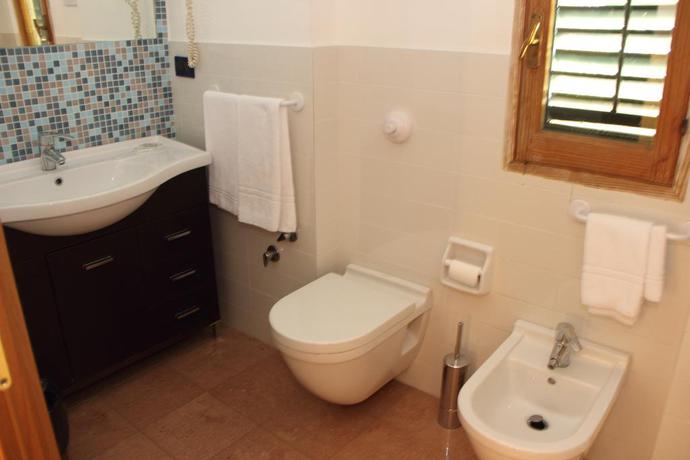 Imagen de la habitación del Hotel Villa Archirafi. Foto 8