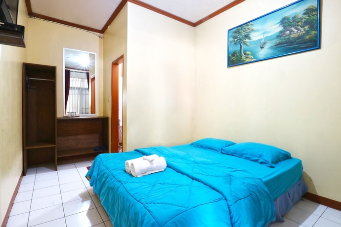 Imagen de la habitación del Hotel Villa Aries Biru. Foto 11