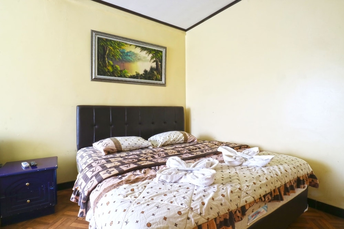 Imagen de la habitación del Hotel Villa Aries Biru. Foto 13