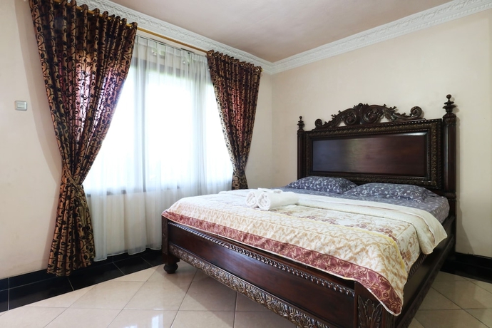 Imagen de la habitación del Hotel Villa Aries Biru. Foto 16