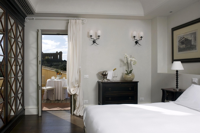 Imagen de la habitación del Hotel Villa Athena Resort. Foto 3