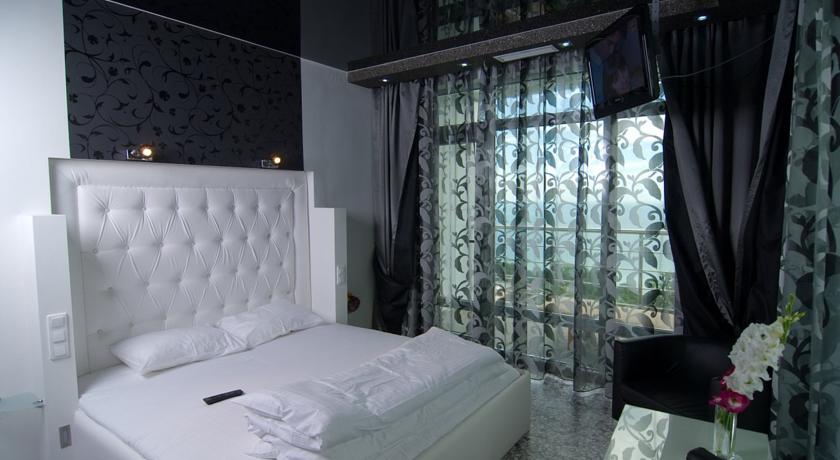 Imagen de la habitación del Hotel Villa Atmosfera. Foto 2