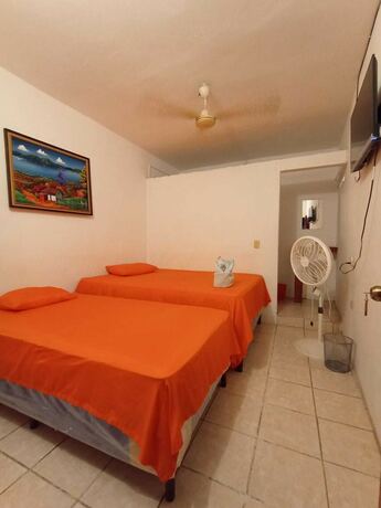 Imagen de la habitación del Hotel Villa Aurora, Flores. Foto 5