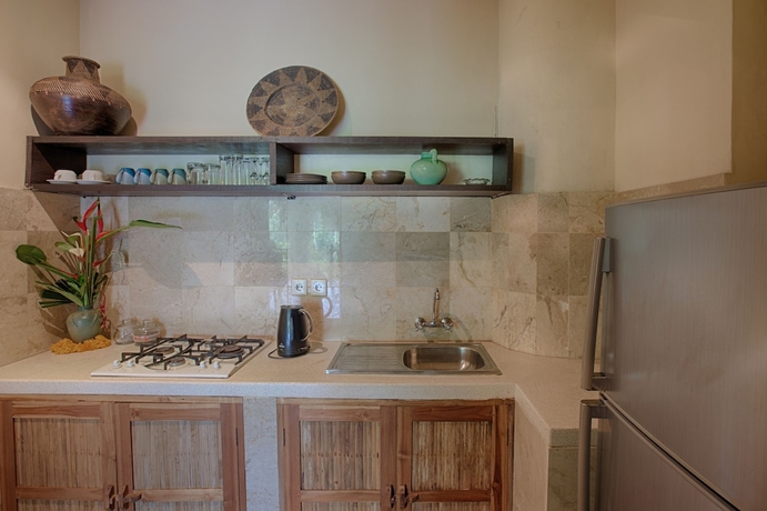 Imagen de la habitación del Hotel Villa Awang Awang. Foto 17