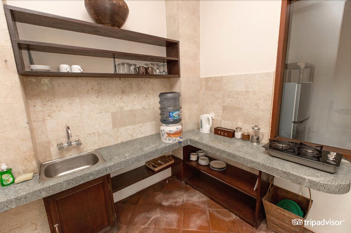 Imagen de la habitación del Hotel Villa Awang Awang. Foto 19