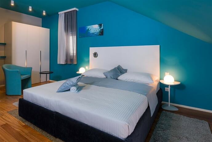Imagen de la habitación del Hotel Villa Azzurra. Foto 17