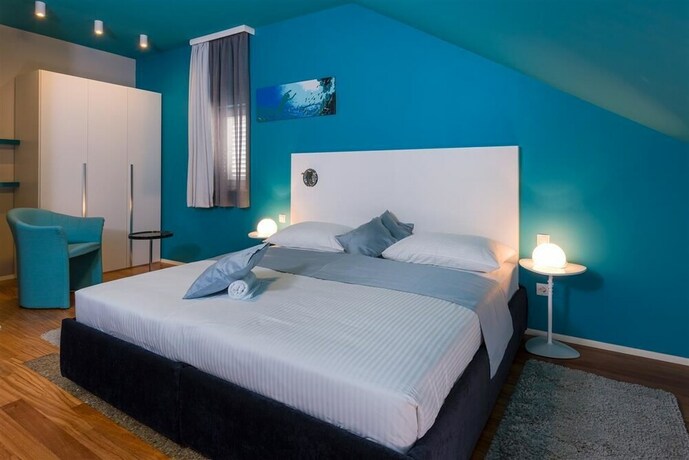 Imagen de la habitación del Hotel Villa Azzurra. Foto 24