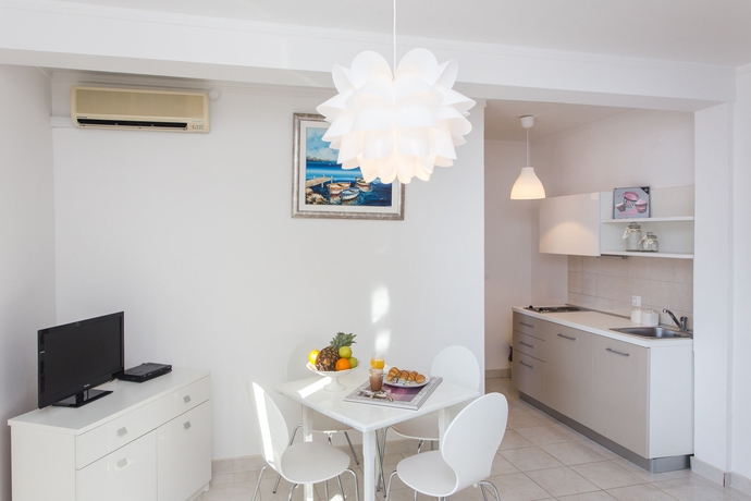 Imagen de la habitación del Hotel Villa Babilon. Foto 8