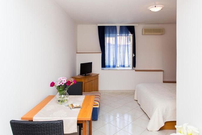 Imagen de la habitación del Hotel Villa Babilon. Foto 14