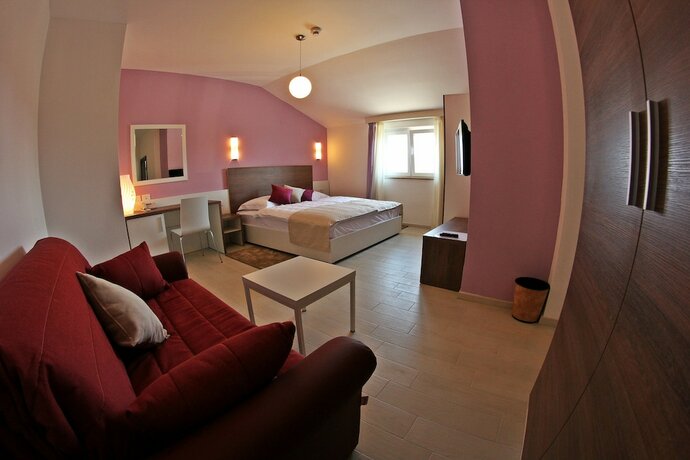 Imagen de la habitación del Hotel Villa Badi. Foto 17