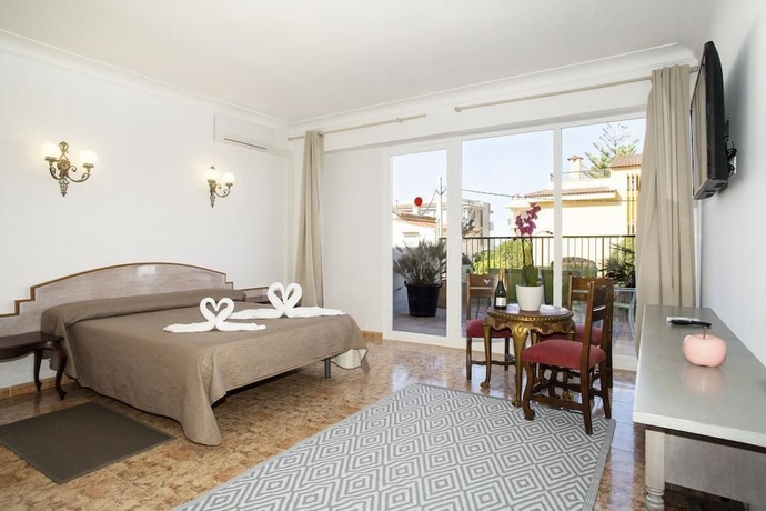 Imagen de la habitación del Hotel Villa Barbara. Foto 13