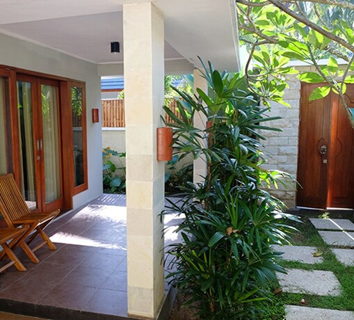 Imagen de la habitación del Hotel Villa Bau Nyale. Foto 16