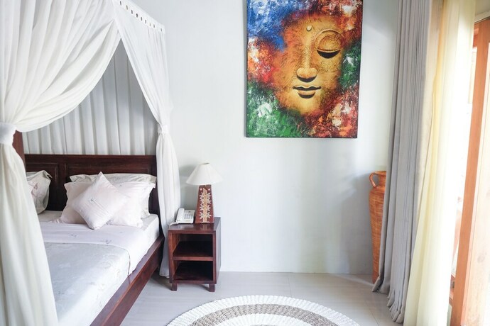 Imagen de la habitación del Hotel Villa Bau Nyale. Foto 20
