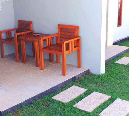 Imagen de la habitación del Hotel Villa Bau Nyale. Foto 28