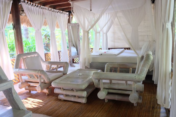 Imagen de la habitación del Hotel Villa Boreh Beach Resort and Spa. Foto 11
