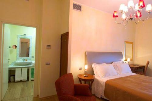 Imagen de la habitación del Hotel Villa Borghi. Foto 12