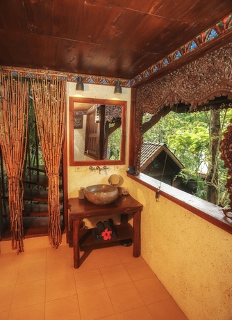 Imagen de la habitación del Hotel Villa Borobudur Resort. Foto 10