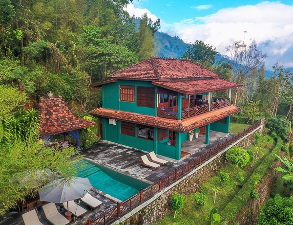 Imagen de la habitación del Hotel Villa Borobudur Resort. Foto 11