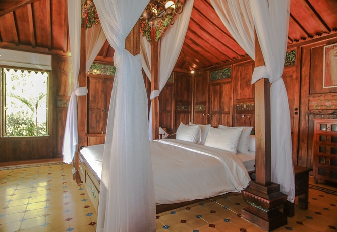 Imagen de la habitación del Hotel Villa Borobudur Resort. Foto 17
