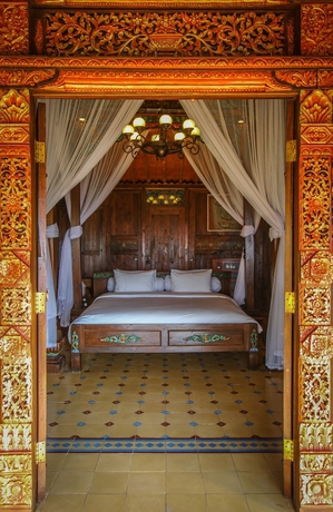 Imagen de la habitación del Hotel Villa Borobudur Resort. Foto 18
