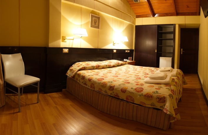 Imagen de la habitación del Hotel Villa Brescia. Foto 8