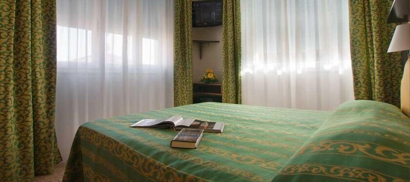 Imagen de la habitación del Hotel Villa Bruna. Foto 26